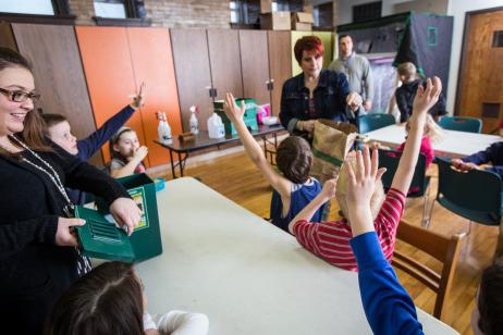 A Carthage education professor demonstrates teaching techniques in a classroom.